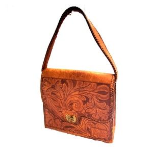 Hand carved leather purse